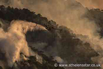 Firefighters see gains against Greece wildfire as winds drop - St Helens Star