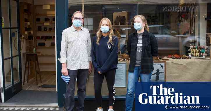 'The masks are everywhere today' – England's shoppers finally cover up