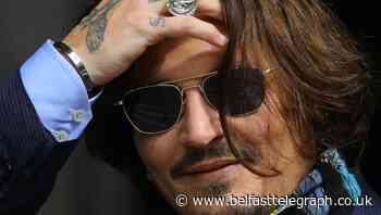 Johnny Depp joked about punching Amber Heard in the face, court told