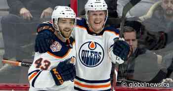 Emily Cave preparing special gift and letter for Edmonton Oilers