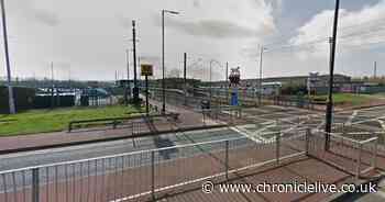 Car crashes into Metro train at level crossing near station