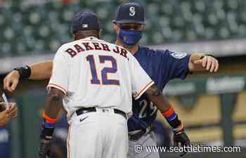 Photos: Mariners get walloped by ‘Stros on Opening Day in Houston - Seattle Times
