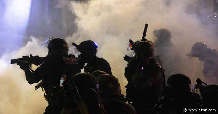 Federal agents use tear gas to clear rowdy Portland protest