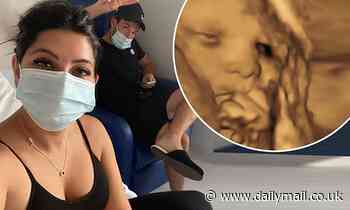 Pregnant Cara De La Hoyde is induced into early labour as she shares hospital snap