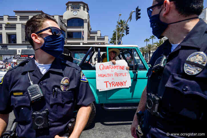 A dozen Huntington Beach police officers and employees have contracted COVID-19