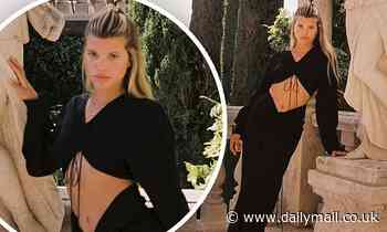 Sofia Richie poses sultrily at her father Lionel's Beverly Hills mansion