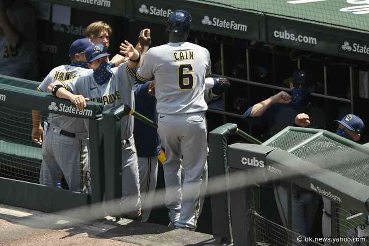 Yelich, Smoak homer, Brewers top Cubs 8-3 in testy matchup