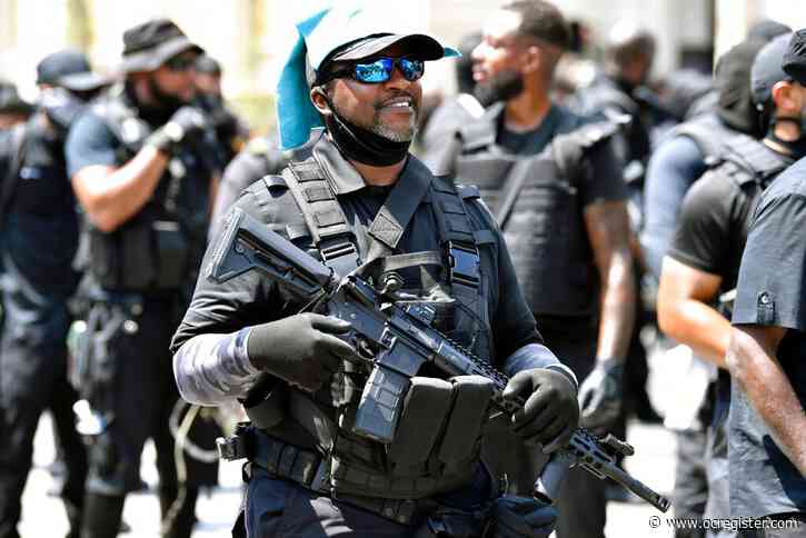 White militia, black activists — both armed — converge on Louisville