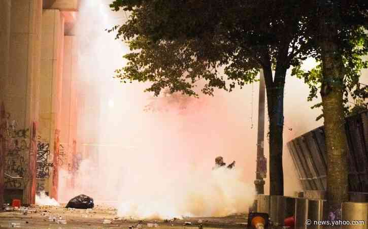 Fresh violence in Portland as police fire tear gas on protesters