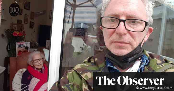‘Happy 100th, Mum’: partying through a care home window