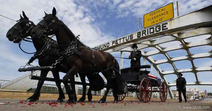 Body of civil rights icon John Lewis crosses Selma bridge