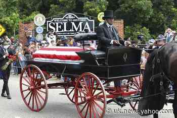 Civil rights hero and congressman John Lewis crosses Selma bridge for last time in Alabama