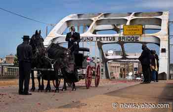 A nation John Lewis helped unite salutes him on his final journey across Selma bridge