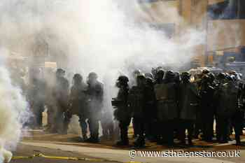 Demonstrators clash with police during protest in Virginia - St Helens Star