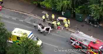 Man taken to hospital after car overturns on busy Newcastle road