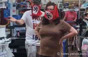 Couple wearing swastika face masks insist they aren&#39;t Nazis as Walmart bans them