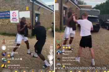 Anthony Joshua spars in Finchley car park after training