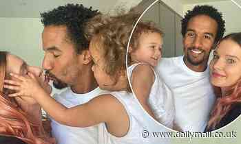 Helen Flanagan and Scott Sinclair's cheeky daughter attempts to stop them from sharing a kiss - Daily Mail