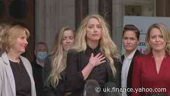 Amber Heard gives statement outside High Court