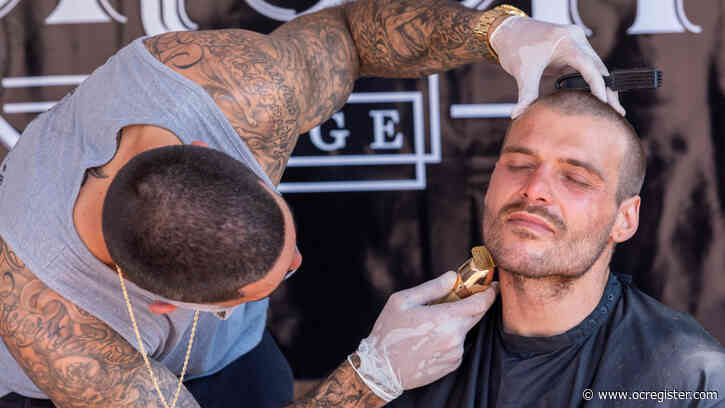 Santa Ana park turns into a barber shop for the day