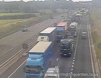 M6 blocked after trailer hits central reservation