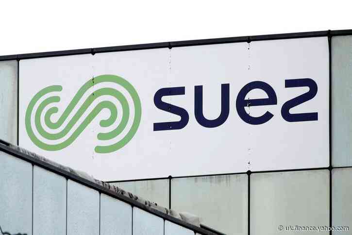 Suez swings to loss, sales fall less than expected