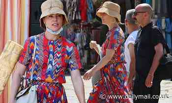 Melissa George looks summer chic as she goes sightseeing in Venice