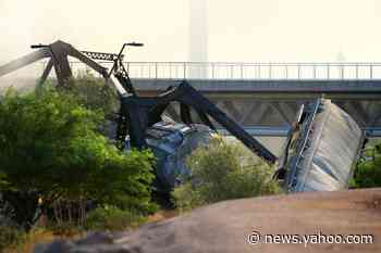 Train carrying hazardous materials derails, catches fire on bridge over Arizona lake