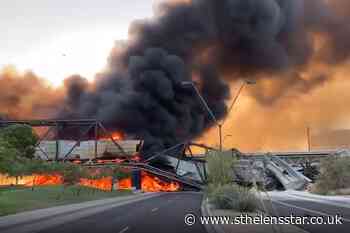 Arizona train derailment causes bridge collapse and fire - St Helens Star