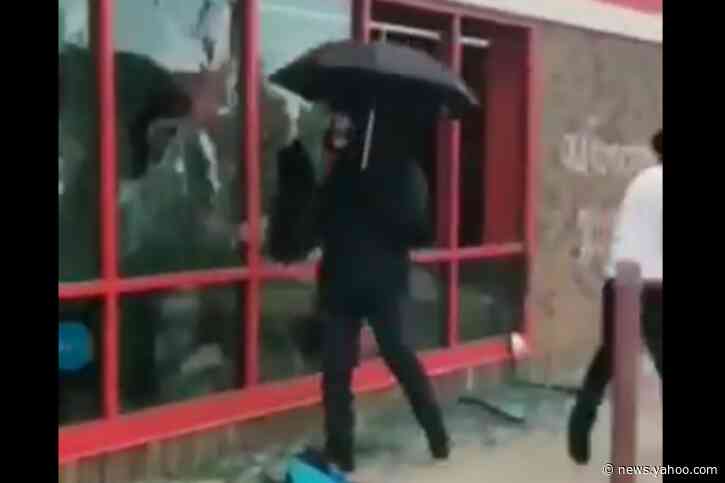 Minneapolis 'umbrella man' is white supremacist who smashed windows to 'incite violence,' police say