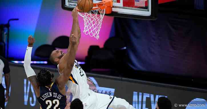 Donovan Mitchell and Rudy Gobert team up to lead Utah Jazz’s 106-104 win in NBA season restart