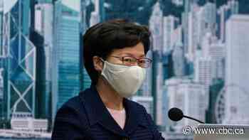 Hong Kong postpones elections by a year, citing coronavirus