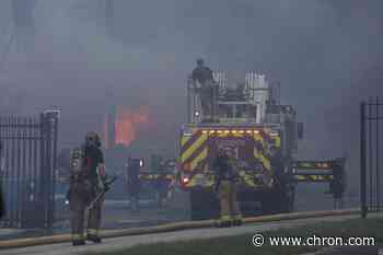 Firefighters battling 3-alarm warehouse fire in SW Houston