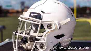 LOOK: College football teams unveil helmet with splash guards to protect players from COVID-19