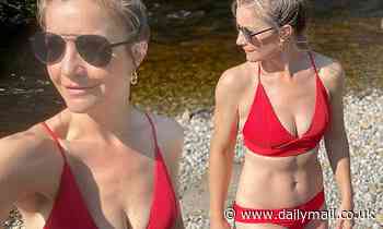 Helen Skelton wears plunging red bikini in Yorkshire stream