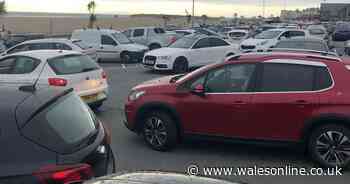 Families plead to be freed after hundreds are trapped for hours in car park