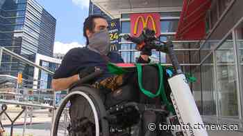 'I can get around pretty quickly': Toronto courier who uses wheelchair looks to challenge misconceptions