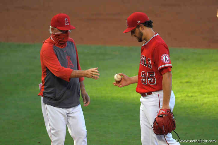 Astros walk over Angels in a slog