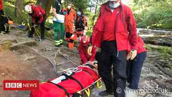 Brecon Beacons waterfall rescuers save woman, 65