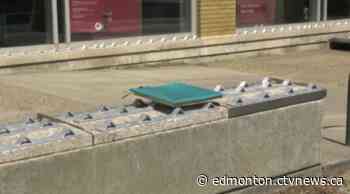 Spikes removed from benches in front of Edmonton bank - CTV News Edmonton