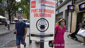 À Lille, installation d'affichettes dans les zones où le masque sera obligatoire - La Voix du Nord