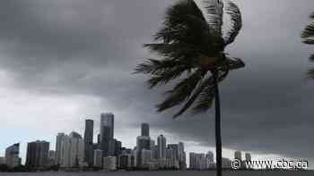 Downgraded Isaias expected to scrape past Florida with heavy rains