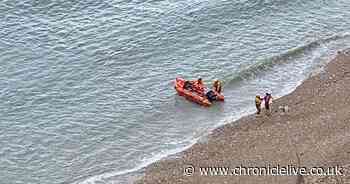 Man and his dog stranded by the tide rescued by the coastguard