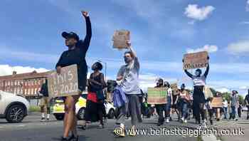 Protesters march for NHS worker injured in racially aggravated hit-and-run