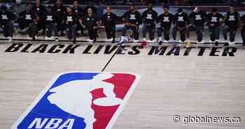 Toronto Raptors kneel for anthems, win 1st real game after COVID-19 break - Global News