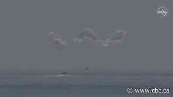 SpaceX mission with NASA astronauts aboard completes 1st splashdown in 45 years