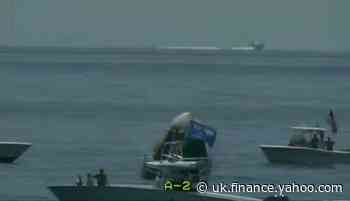 SpaceX splashdown: Dozens of boats including one with Trump flag circle around Nasa astronauts as they return to Earth