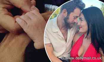 Nikki Bella and her fiancé Artem Chigvintsev share first snap of their 'precious baby boy'