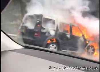 Fire crews deal with car ablaze on motorway near Horwich - The Bolton News