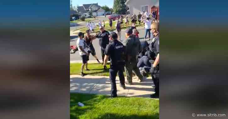 Police and protesters clash in Cottonwood Heights; officers detain several demonstrators
